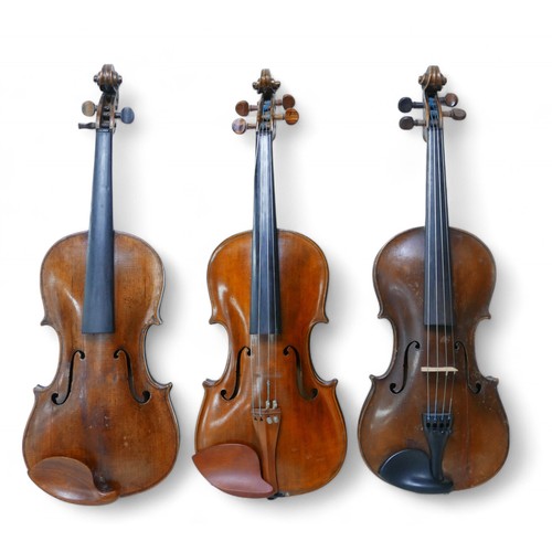 195 - Three 19th century and later continental violins, including one bearing label 'Joseph Rocca OR Premi... 