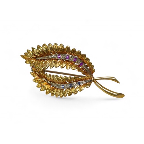 97 - An 18ct gold ruby and sapphire fern style brooch, with four small rubies and three small sapphires, ... 