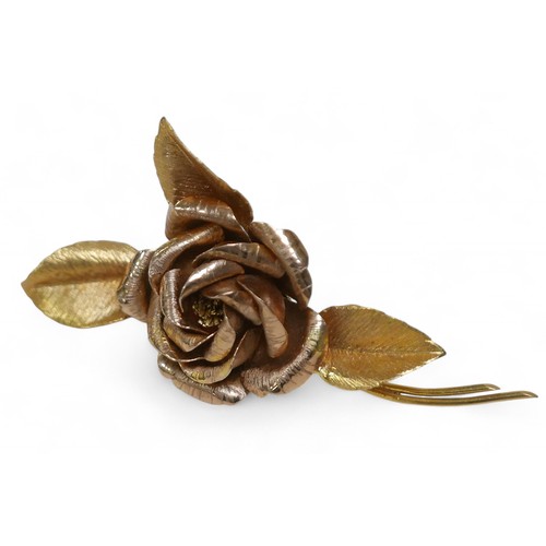 80 - An 18ct gold rose form brooch, 6.5cm wide, 12.6g.