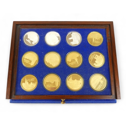 2 - A cased set of thirty six proof Silver medallions - the beauty of Britain's churches , with folder, ... 