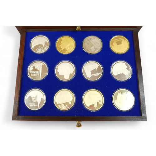 2 - A cased set of thirty six proof Silver medallions - the beauty of Britain's churches , with folder, ... 