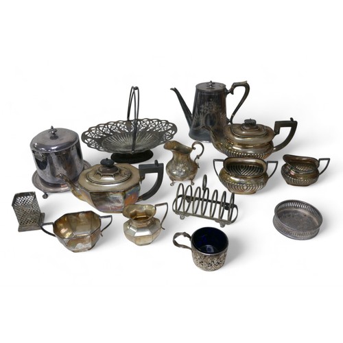 295 - A collection of silver plate, including a Mappin biscuit tin, an oval form bowl with pierced decorat... 