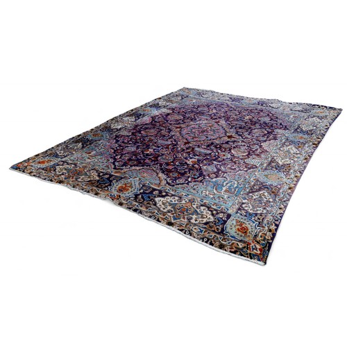 385 - A Persian hand knotted woolen carpet, with a blue field and stylized border, 405 by 308cm.