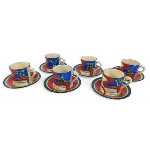 213 - A Clarice Cliff coffee set, decorated in the 'Sunrise (red)' pattern, circa 1929, comprising six cof... 