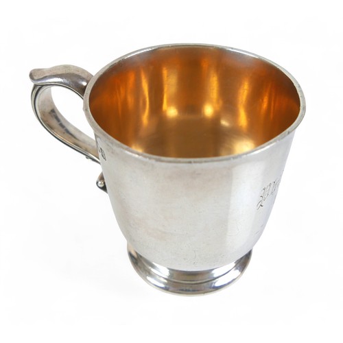 113 - A silver presentation small tankard and a silver serviette ring, total weight 257.9g/8.2toz. (2)