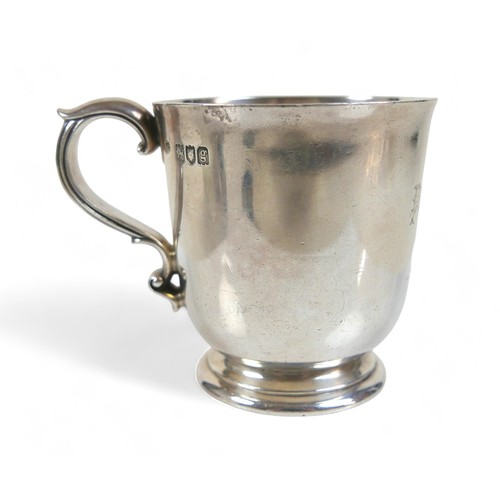 113 - A silver presentation small tankard and a silver serviette ring, total weight 257.9g/8.2toz. (2)