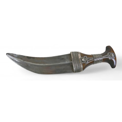 290 - An Omani silver  Khanjar dagger  with rhino horn handle late 19th early 20th century, with J shape s... 