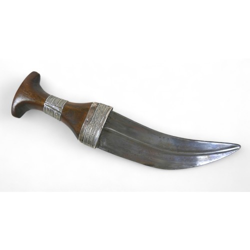 290 - An Omani silver  Khanjar dagger  with rhino horn handle late 19th early 20th century, with J shape s... 