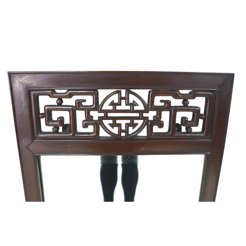 353 - A Chinese hardwood framed wall mirror, with carved detail, 45 by 3 by 101cm high.