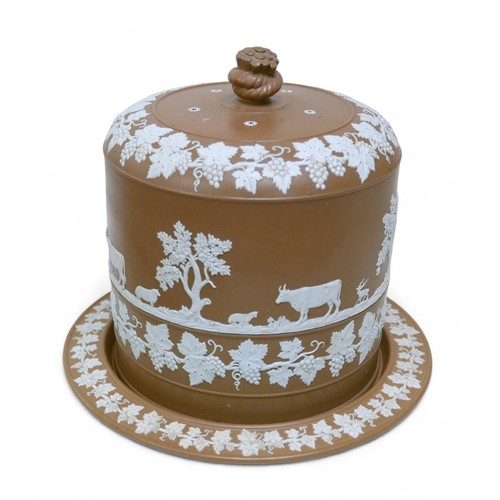 179 - A Wedgwood style brown jasperware cheese dome and base, with applied decoration, 31.5 by 30cm high.