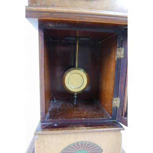 276 - A mahogany mantle clock in the form of a long case clock, 22 by 14 by 46cm high.