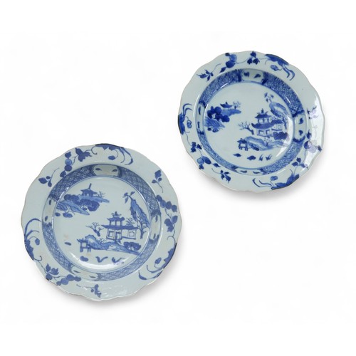 170 - Chinese porcelain, a pair of Nanking cargo blue and white plate, with scalloped rims, Christie's lab... 