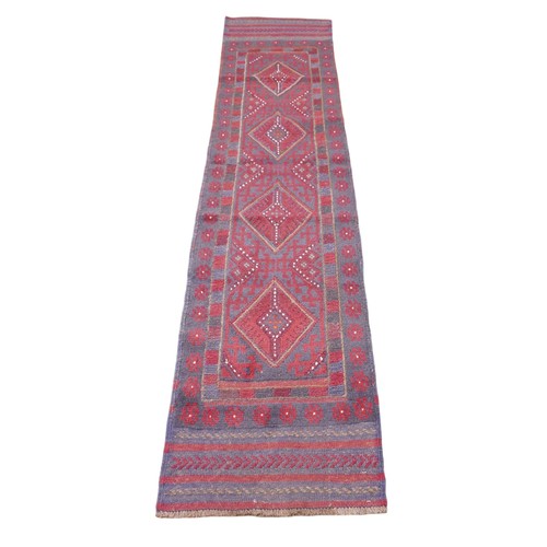 379 - Meshwani hand knotted woollen runner rug, 244 by 55cm.