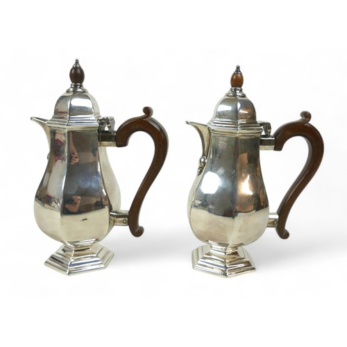 130 - A pair of silver coffee pots, each of hexagonal form, possibly R H Halford & Sons Ltd, London 1925, ... 