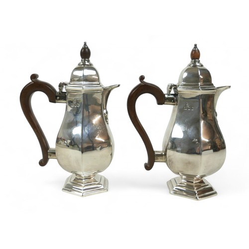 130 - A pair of silver coffee pots, each of hexagonal form, possibly R H Halford & Sons Ltd, London 1925, ... 