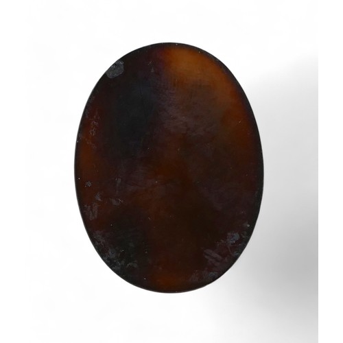 59 - An early 19th century onyx cameo of Mary Queen of Scots, without mount, 2.5 by 3.4cm.