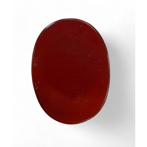 66 - An early 19th carnelian white stone cameo of Apollo, 3 by 4cm.