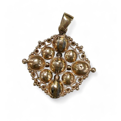 54 - A pink stone and half pearl gold pendant, with cannetille work design, 2.2 by 2.7cm overall, 3.5g.