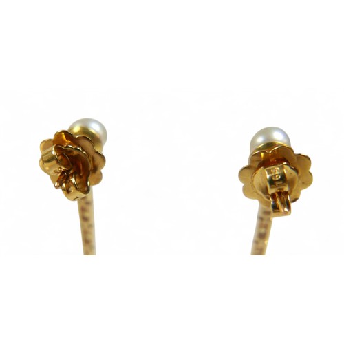 65 - A pair of 18ct gold pearl and yellow sapphire drop earrings, each earring with a two cultured pearls... 