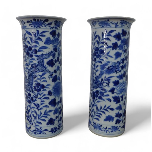 293 - A pair of Chinese blue and white cylinder vases and a famille rose vase, cylinder vases have four ch... 