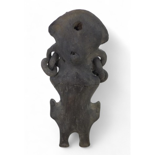 185 - A black ware figure, possibly pre-Columbian, 10 by 6 by 20cm high.