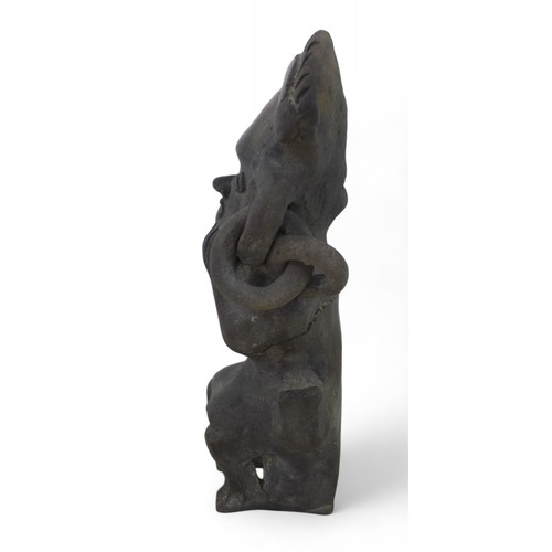 185 - A black ware figure, possibly pre-Columbian, 10 by 6 by 20cm high.