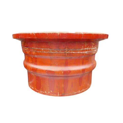 161 - An oriental red lacquer wooden barrel, 78cm diameter 44cm high.