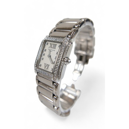 157 - A Patek Philippe ladies 18ct white gold diamond bracelet wristwatch, model TWENT-4 number 4908/200G-... 