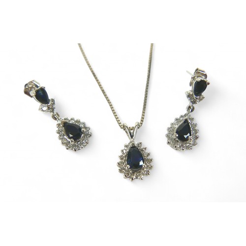 86 - A white gold sapphire and diamond earring and pendant necklace set, pear shaped setting in 14ct whit... 