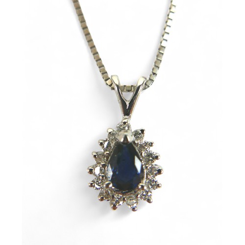 86 - A white gold sapphire and diamond earring and pendant necklace set, pear shaped setting in 14ct whit... 