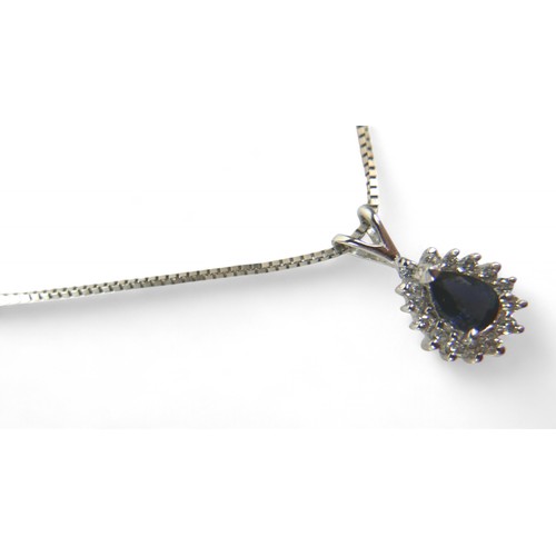 86 - A white gold sapphire and diamond earring and pendant necklace set, pear shaped setting in 14ct whit... 