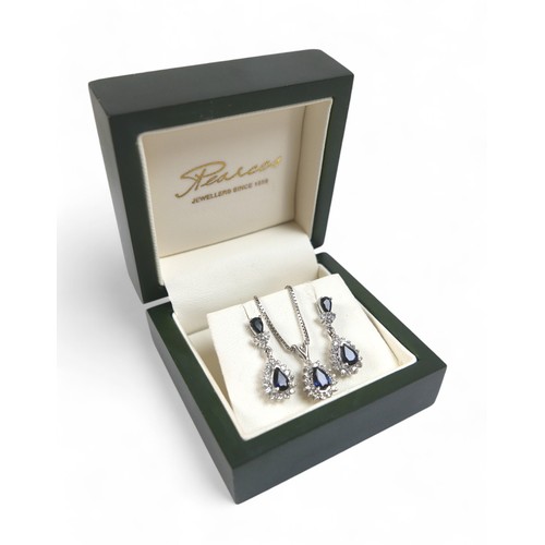 86 - A white gold sapphire and diamond earring and pendant necklace set, pear shaped setting in 14ct whit... 