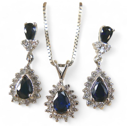 86 - A white gold sapphire and diamond earring and pendant necklace set, pear shaped setting in 14ct whit... 