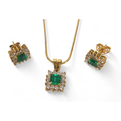 88 - An 18ct yellow gold emerald and diamond earring pendant set, on a 9ct yellow gold chain 44cm long, p... 