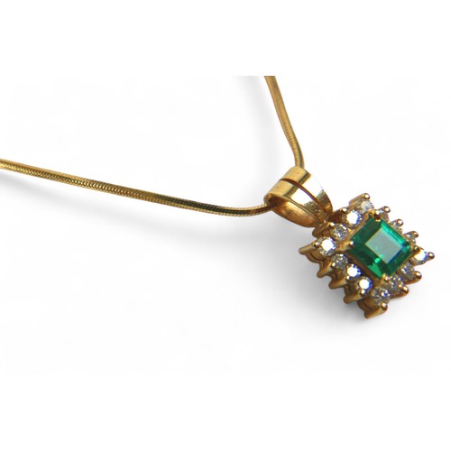 88 - An 18ct yellow gold emerald and diamond earring pendant set, on a 9ct yellow gold chain 44cm long, p... 