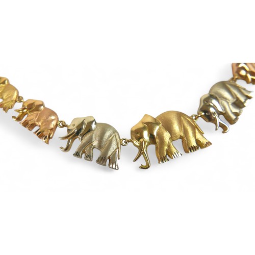 91 - An 18ct tri-colour gold suite of elephant jewellery, comprising a 45cm long necklace, bracelet, earr... 