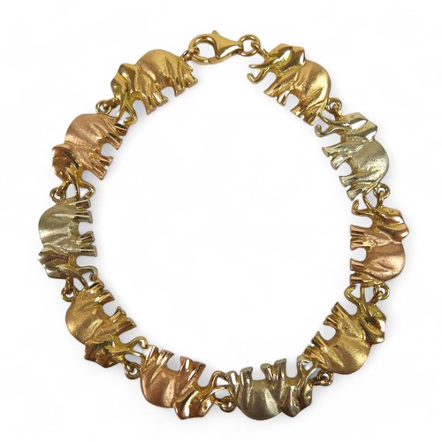 91 - An 18ct tri-colour gold suite of elephant jewellery, comprising a 45cm long necklace, bracelet, earr... 