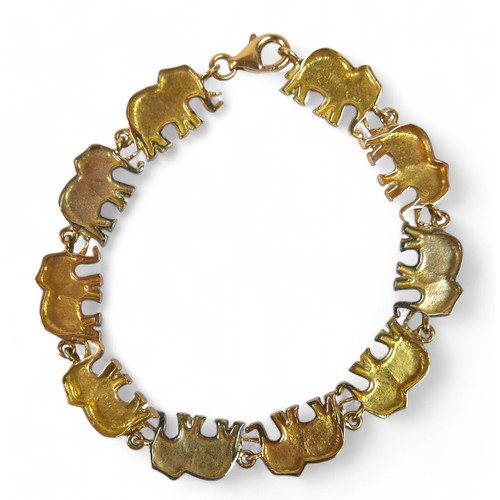 91 - An 18ct tri-colour gold suite of elephant jewellery, comprising a 45cm long necklace, bracelet, earr... 