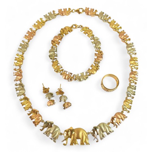 91 - An 18ct tri-colour gold suite of elephant jewellery, comprising a 45cm long necklace, bracelet, earr... 