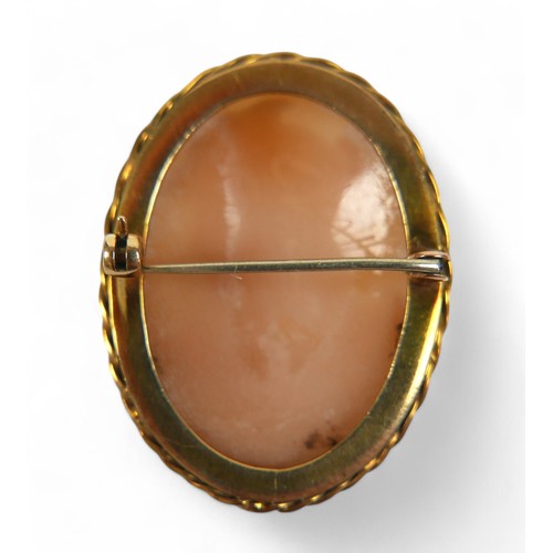 42 - Two gilt metal cameo brooches, largest 36.7 by 12.9 by 51.4mm. (2)