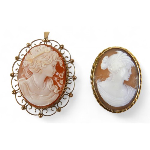 42 - Two gilt metal cameo brooches, largest 36.7 by 12.9 by 51.4mm. (2)