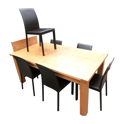 348 - An oak dining table and six chairs, table 179 by 99 by 77cm high, will extend to 249cm.