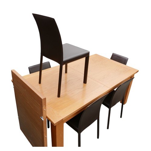 348 - An oak dining table and six chairs, table 179 by 99 by 77cm high, will extend to 249cm.