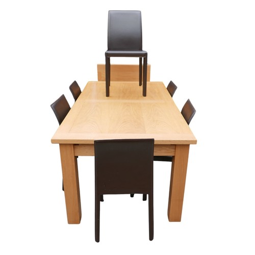 348 - An oak dining table and six chairs, table 179 by 99 by 77cm high, will extend to 249cm.