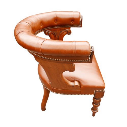 370 - A Victorian button leather mahogany library chair on turned legs, 62 by 59 by 74cm high.