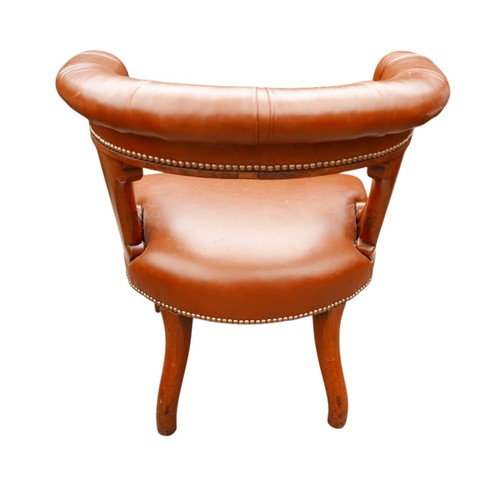 370 - A Victorian button leather mahogany library chair on turned legs, 62 by 59 by 74cm high.