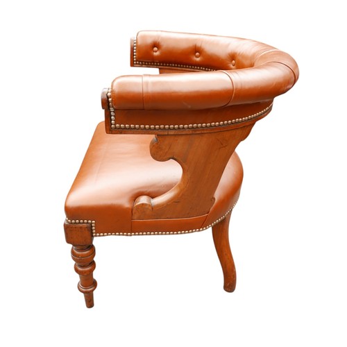 370 - A Victorian button leather mahogany library chair on turned legs, 62 by 59 by 74cm high.