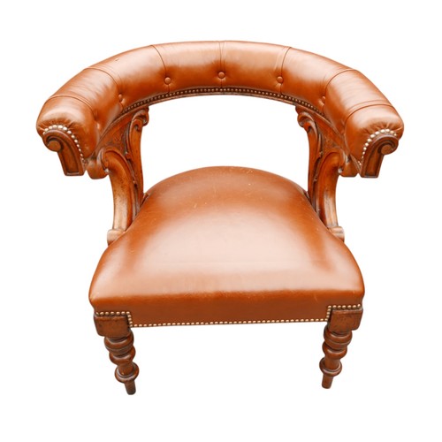 370 - A Victorian button leather mahogany library chair on turned legs, 62 by 59 by 74cm high.