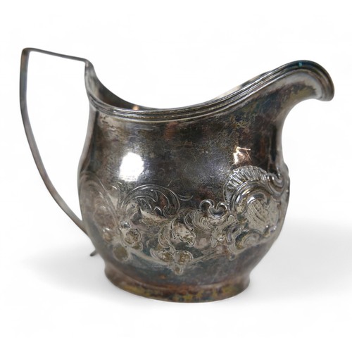 103 - A silver George III jug with gilt interior, London 1806, maker I.M, 9cm high, engraved M to front wi... 