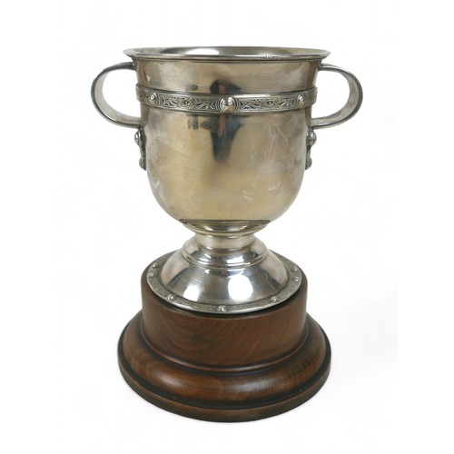 122 - A silver two-handled presentation cup, Birmingham 1938, maker WG & S for William Greenwood & Sons, d... 